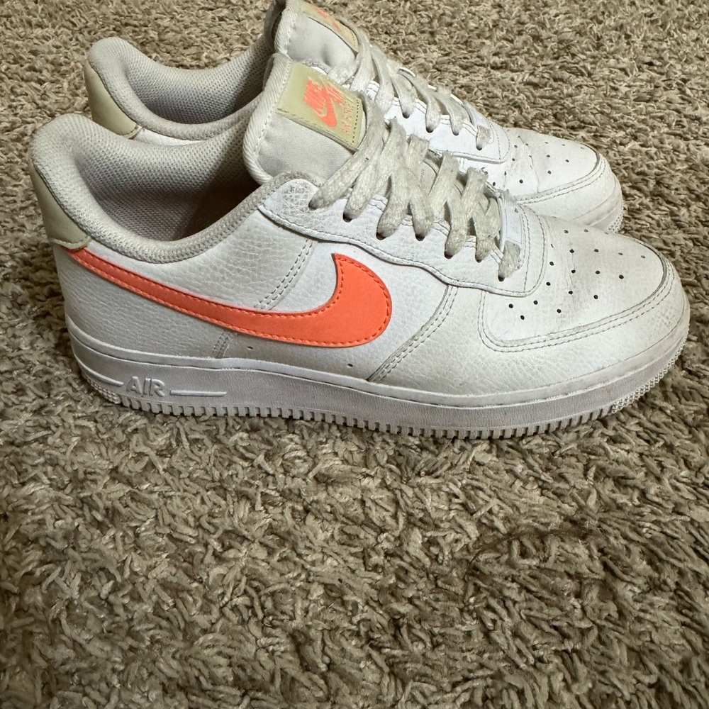 Nike White Low-Top Sneakers with Coral Swoosh